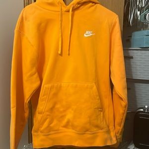 Orange Nike sweatshirt